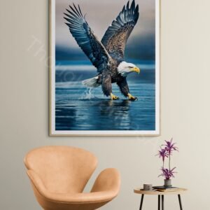 High-resolution photograph of a majestic bald eagle in flight with wings fully extended against a blurred blue background. Detailed view of the white head, dark brown feathers, and sharp yellow beak in dynamic mid-air motion.